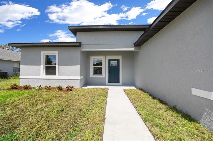 Front exterior of a new home in , Ocala, FL, highlighting curb appeal (Image 9). Front exterior of a new home in , Ocala, FL, highlighting curb appeal (Image 9).