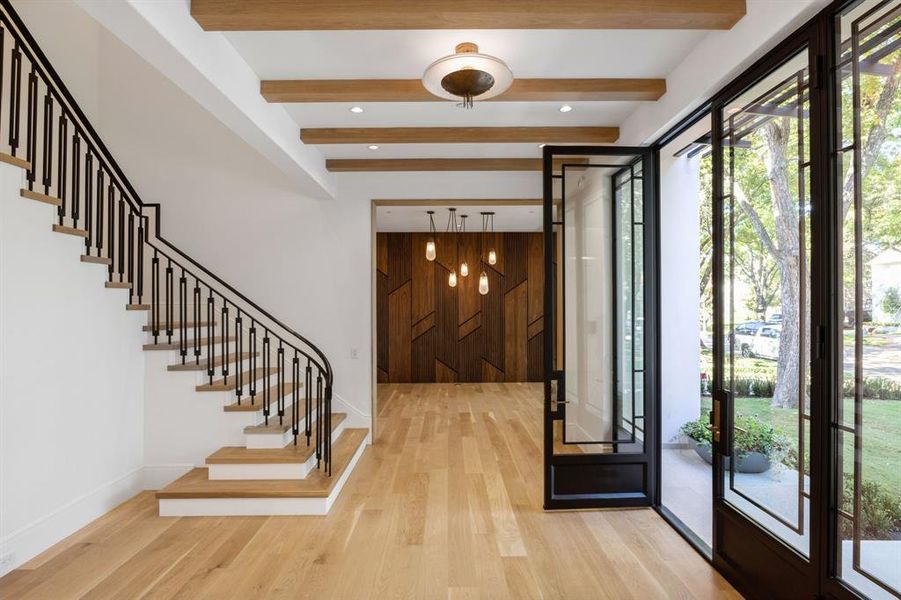 Foyer with white oak beamed ceiling