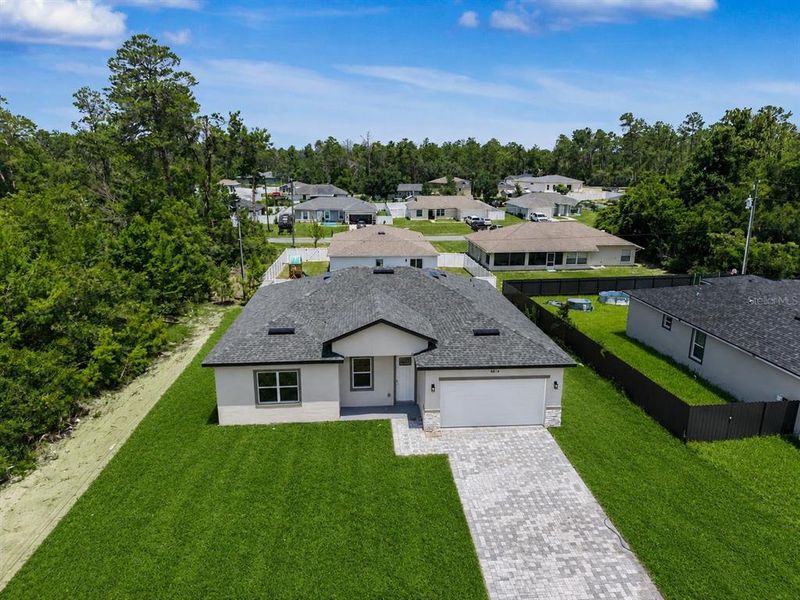 Front exterior of a new home in , Ocala, FL, highlighting curb appeal (Image 24).