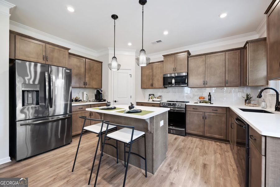 Furnished interior view inside a new home in Maddox Station, Eatonton (Image 9).