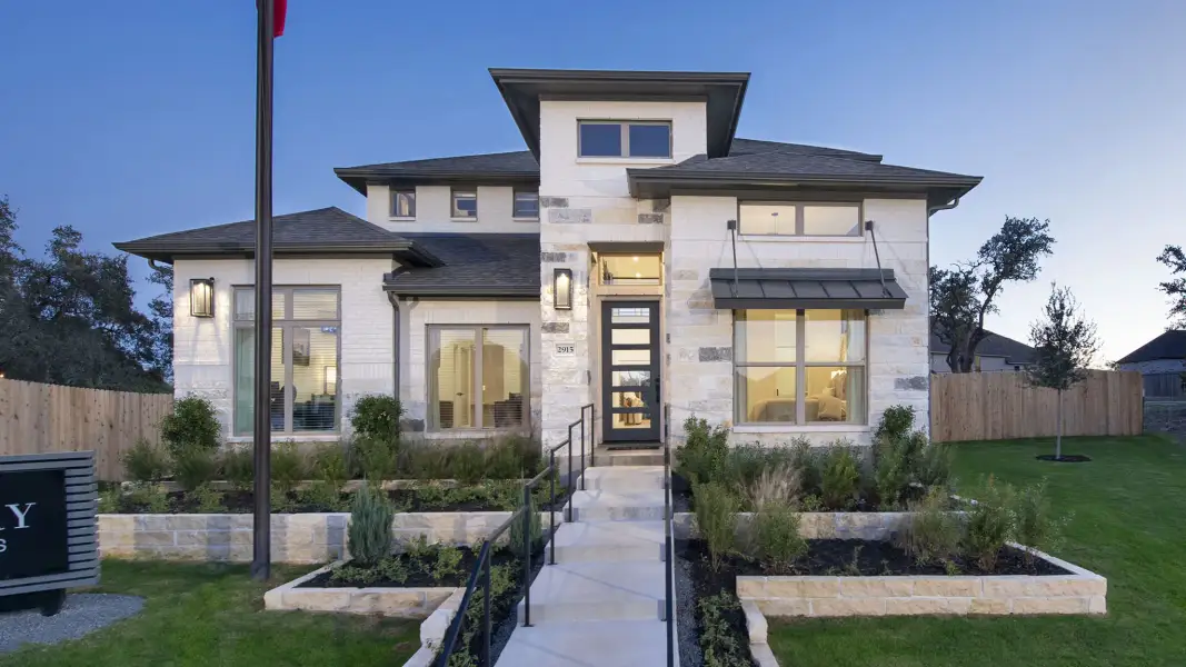 Front exterior of a new home in Parkside Peninsula, Georgetown, TX, highlighting curb appeal (Image 10). Front exterior of a new home in Parkside Peninsula, Georgetown, TX, highlighting curb appeal (Image 10).