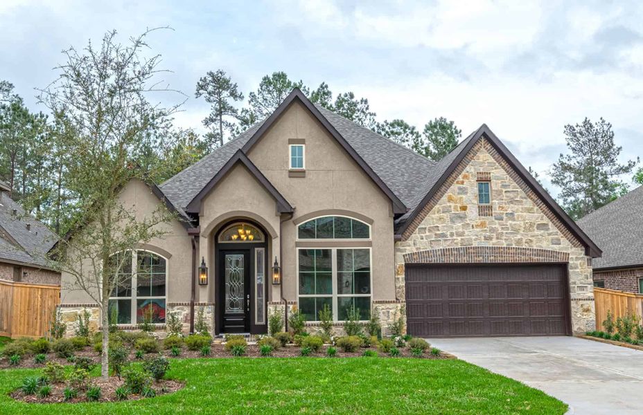 Representative exterior photo of a completed home built from the 3030 by Ravenna Homes in The Woodlands Hills 65′, Willis, TX (Image 23). Representative exterior photo of a completed home built from the 3030 by Ravenna Homes in The Woodlands Hills 65′, Willis, TX (Image 23).