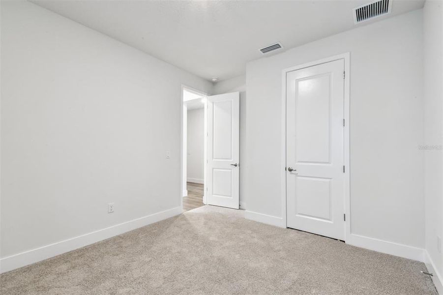 Spacious, unfurnished interior of a new home in The Peninsula at Rhodine Lake, Riverview (Image 35).