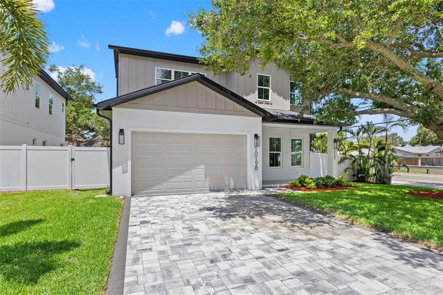 Front exterior of a new home in , Seminole, FL, highlighting curb appeal (Image 23). Front exterior of a new home in , Seminole, FL, highlighting curb appeal (Image 23).