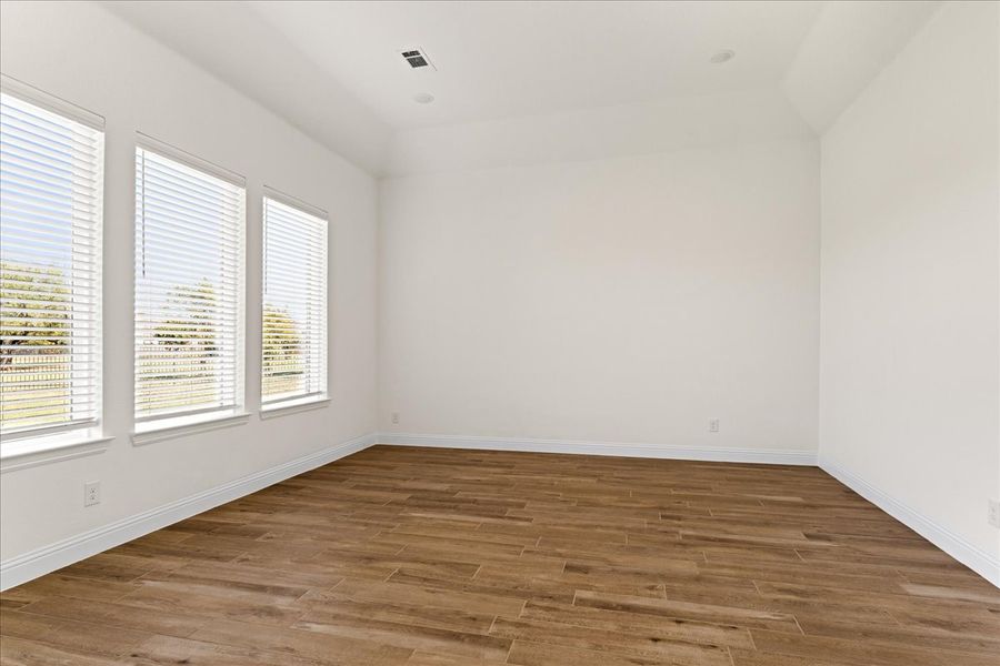 Representative unfurnished interior of a home built from the The Braden II by Doug Parr Custom Homes in Kessler Farms, Brock (Image 47).