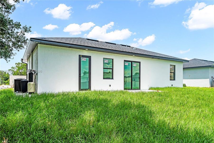 Exterior details and patio area of a home in , Lehigh Acres (Image 30). Exterior details and patio area of a home in , Lehigh Acres (Image 30).