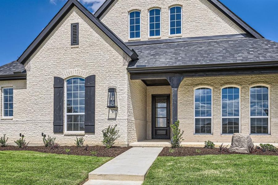 View of front of home with a front lawn