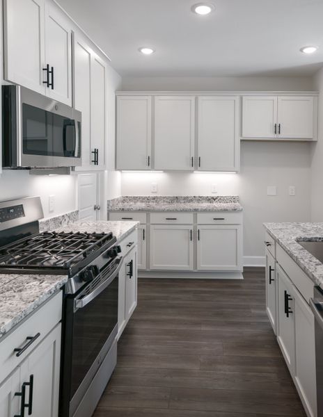 Representative furnished interior of a home built from the The Ivory by Cothran Homes in Holly Ridge, Greenville (Image 6).