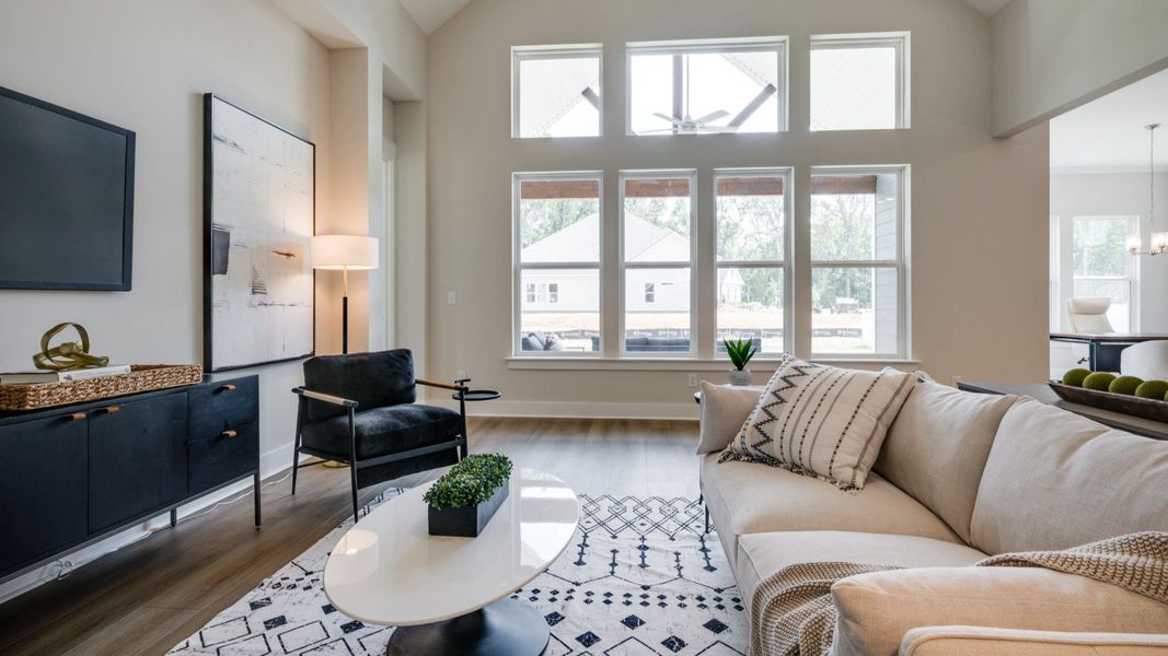 Large windows separating indoor and outdoor living areas