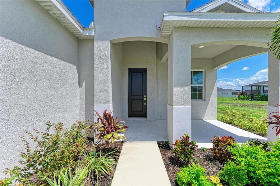 Exterior details and patio area of a home in The Willows, Parrish (Image 3).