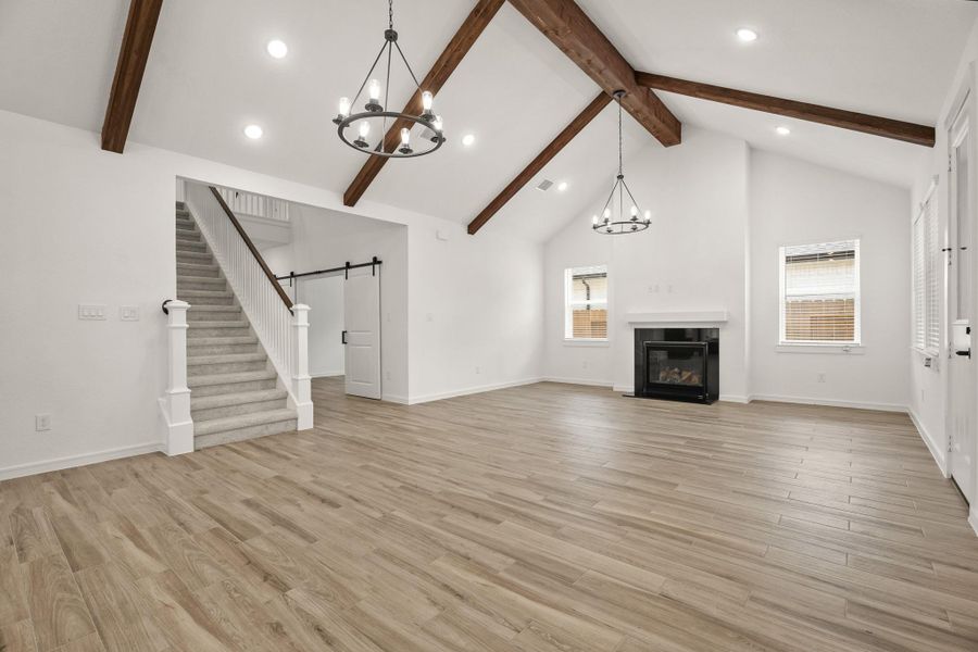 Open dining area and great room with high ceiling (*Photo not of actual home and used for illustration purposes only.)