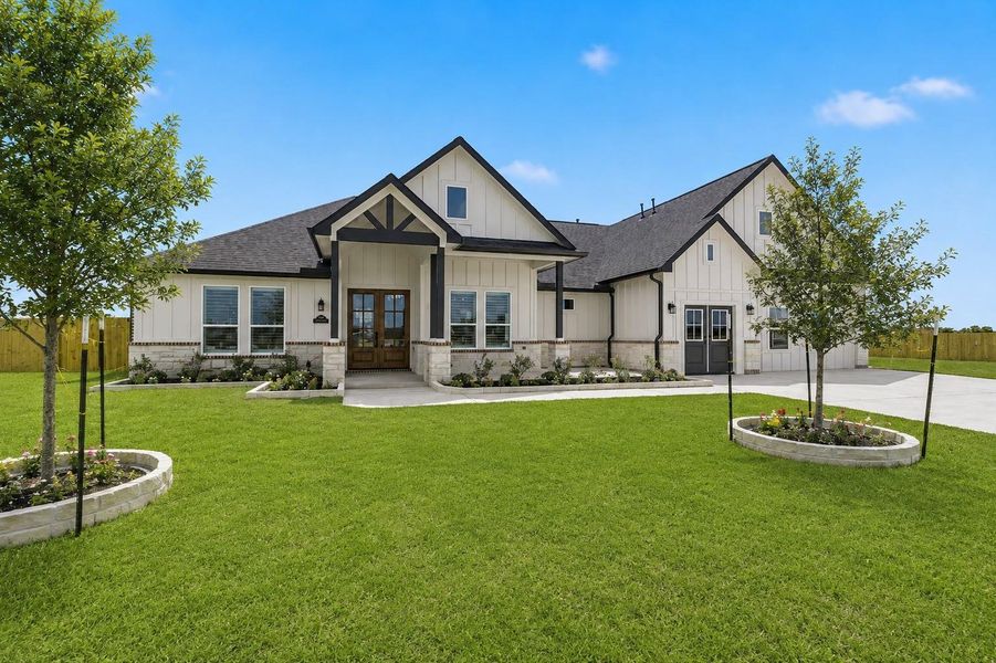 Front exterior of a new home in Magnolia Trails, Needville, TX, highlighting curb appeal (Image 1). Front exterior of a new home in Magnolia Trails, Needville, TX, highlighting curb appeal (Image 1).