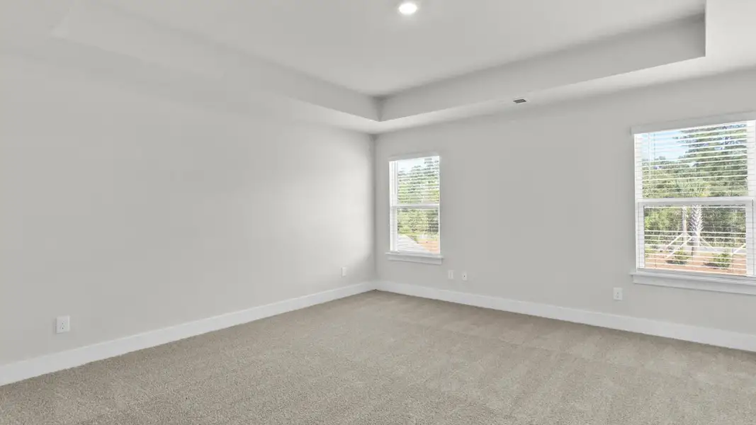 Spacious, unfurnished interior of a new home in The Highlands at Cedar Hill Landing, Navassa (Image 23).