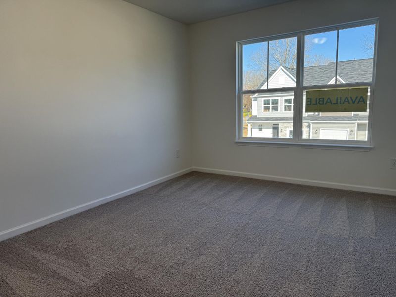 Spacious, unfurnished interior of a new home in East Main Townes, Spartanburg (Image 15).