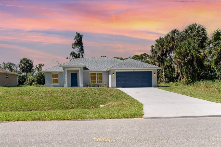 Front exterior of a new home in , North Port, FL, highlighting curb appeal (Image 15).