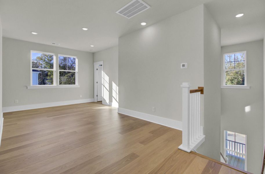 Spacious, unfurnished interior of a new home in Indigo Grove Single Family Homes, Johns Island (Image 34).