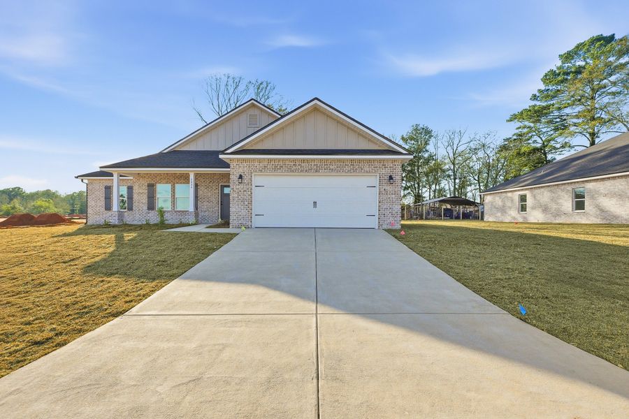 Front exterior of a new home in Barton's Bend, Crestview, FL, highlighting curb appeal (Image 22). Front exterior of a new home in Barton's Bend, Crestview, FL, highlighting curb appeal (Image 22).