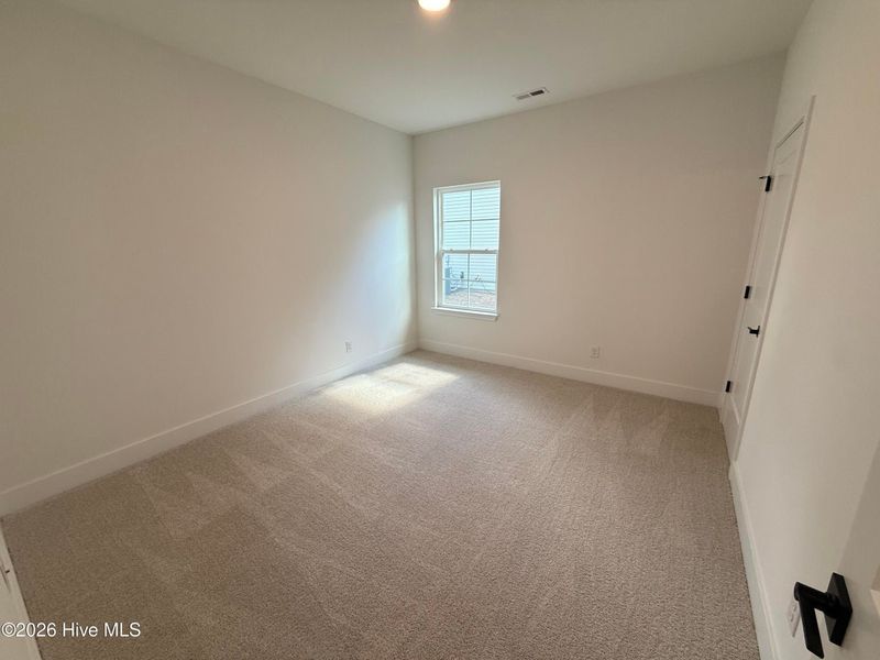 Spacious, unfurnished interior of a new home in Wood Creek Landing, Leland (Image 27). Spacious, unfurnished interior of a new home in Wood Creek Landing, Leland (Image 27).
