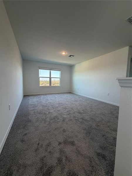 Spacious, unfurnished interior of a new home in Eagletail Landings, Howey-in-the-Hills (Image 7).