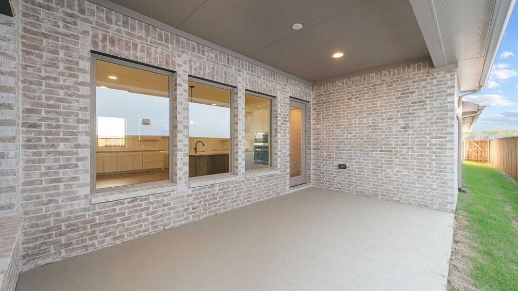Exterior details and patio area of a home in The Parks At Wilson Creek 40', Celina (Image 3). Exterior details and patio area of a home in The Parks At Wilson Creek 40', Celina (Image 3).