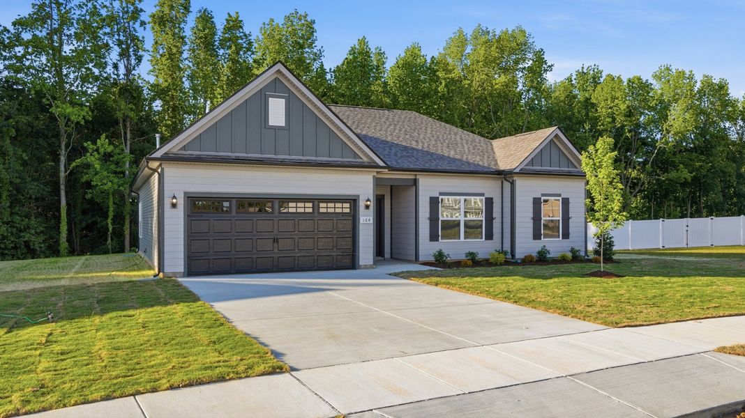 Front exterior of a new home in Stillwater, Tullahoma, TN, highlighting curb appeal (Image 1). Front exterior of a new home in Stillwater, Tullahoma, TN, highlighting curb appeal (Image 1).