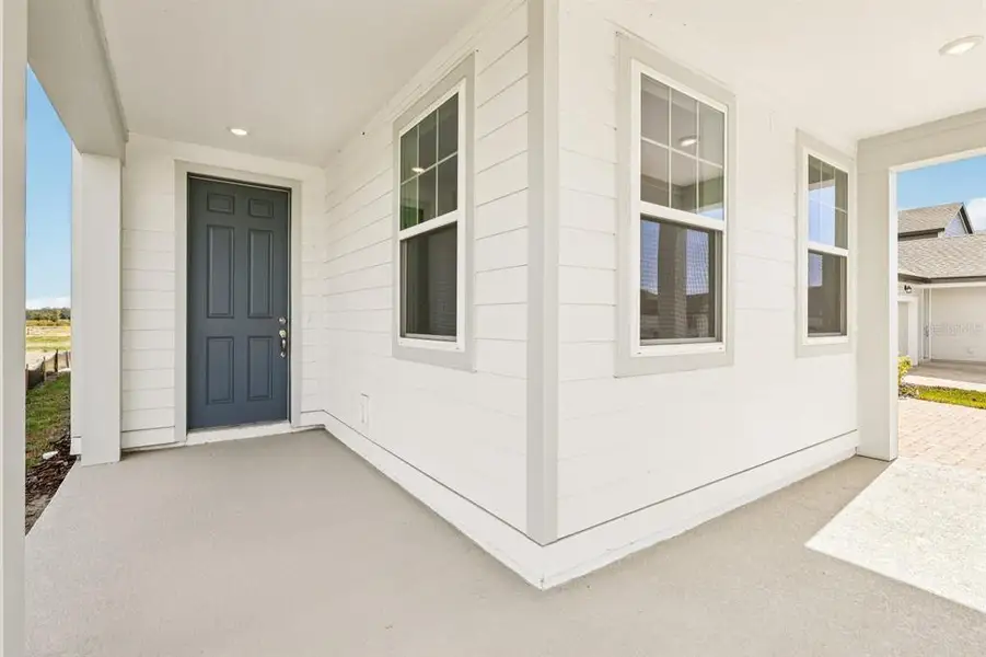 Exterior details and patio area of a home in Trailside, Mount Dora (Image 3).