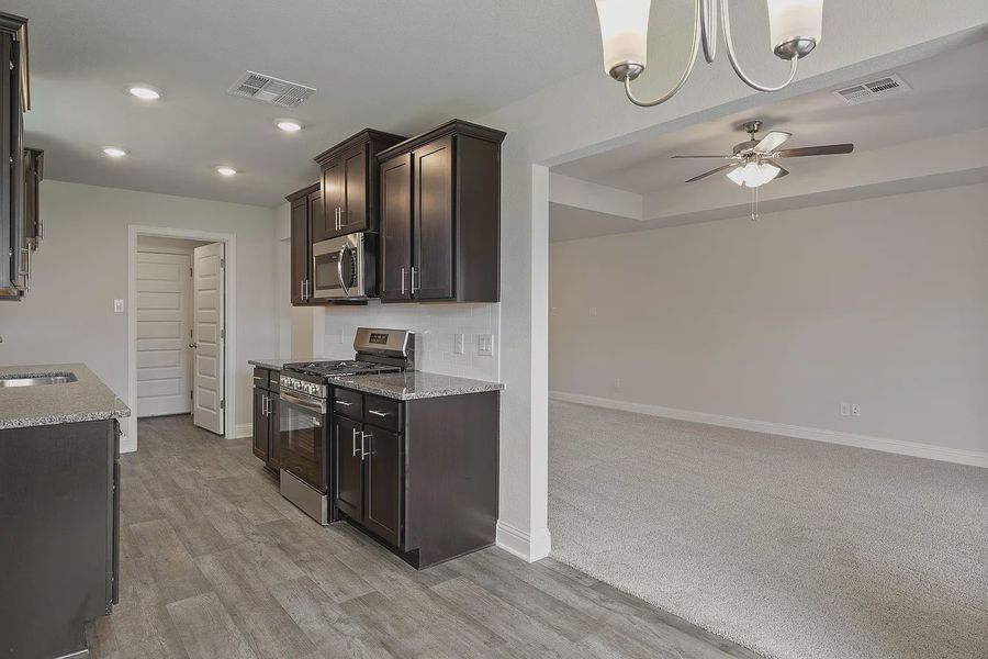 Furnished interior view inside a new home in Grand Oaks Reserve, Cleveland (Image 6).