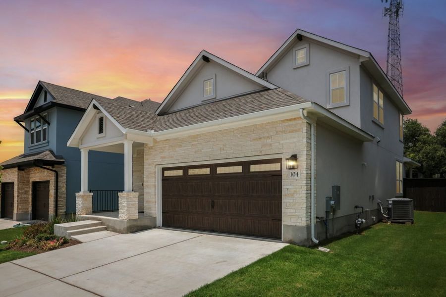 Front exterior of a new home in Clear Creek, Round Rock, TX, highlighting curb appeal (Image 2). Front exterior of a new home in Clear Creek, Round Rock, TX, highlighting curb appeal (Image 2).