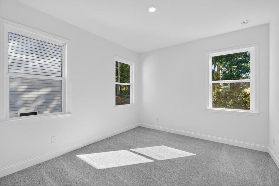 Spacious, unfurnished interior of a new home in Bailey Fence, Dacula (Image 28).