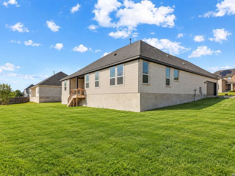 Exterior details and patio area of a home in Potranco Oaks, Castroville (Image 4).