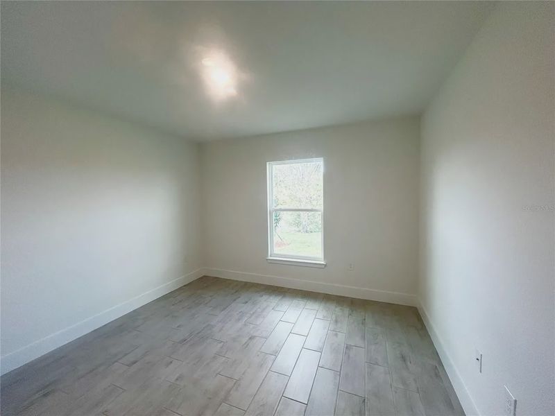 Spacious, unfurnished interior of a new home in Deep Creek, Punta Gorda (Image 22).