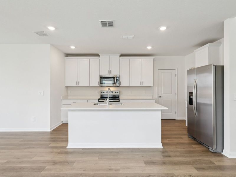 Furnished interior view inside a new home in The Reserve at Hammock Oaks - Classic Series, Lady Lake (Image 3).