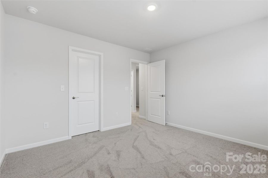 Spacious, unfurnished interior of a new home in Redhawk: Enclave, Belmont (Image 27).