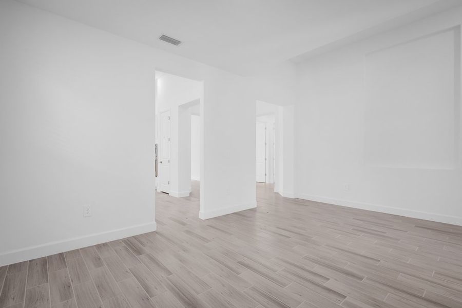 Spacious, unfurnished interior of a new home in The Cove at West Port, Port Charlotte (Image 19).