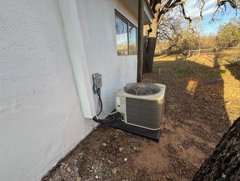 Exterior details and patio area of a home in , May (Image 8). Exterior details and patio area of a home in , May (Image 8).