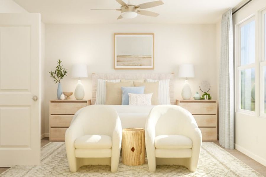 A room with a couch and chairs.