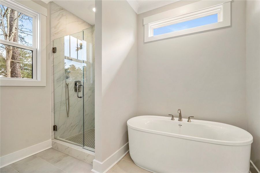 This residence features a patio with a built-in fi