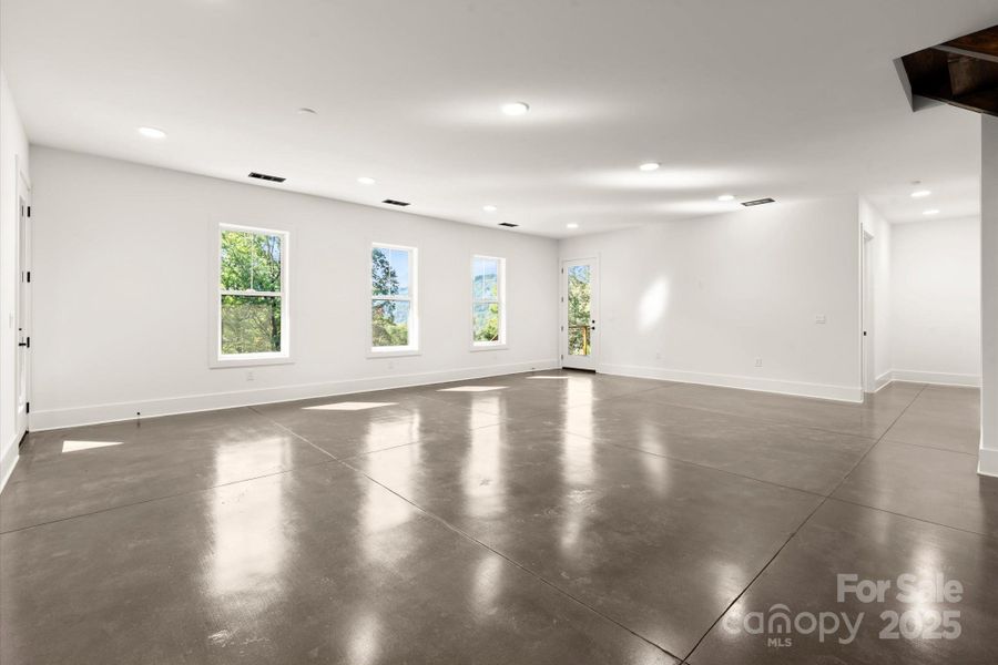 Spacious, unfurnished interior of a new home in , Cashiers (Image 24).