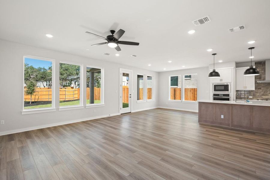 Spacious, unfurnished interior of a new home in Terrace Collection at Heritage, Dripping Springs (Image 26).