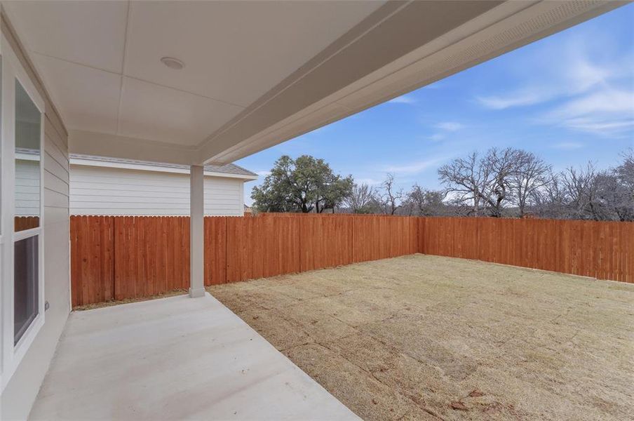 Exterior details and patio area of a home in Covenant Park, Springtown (Image 4).