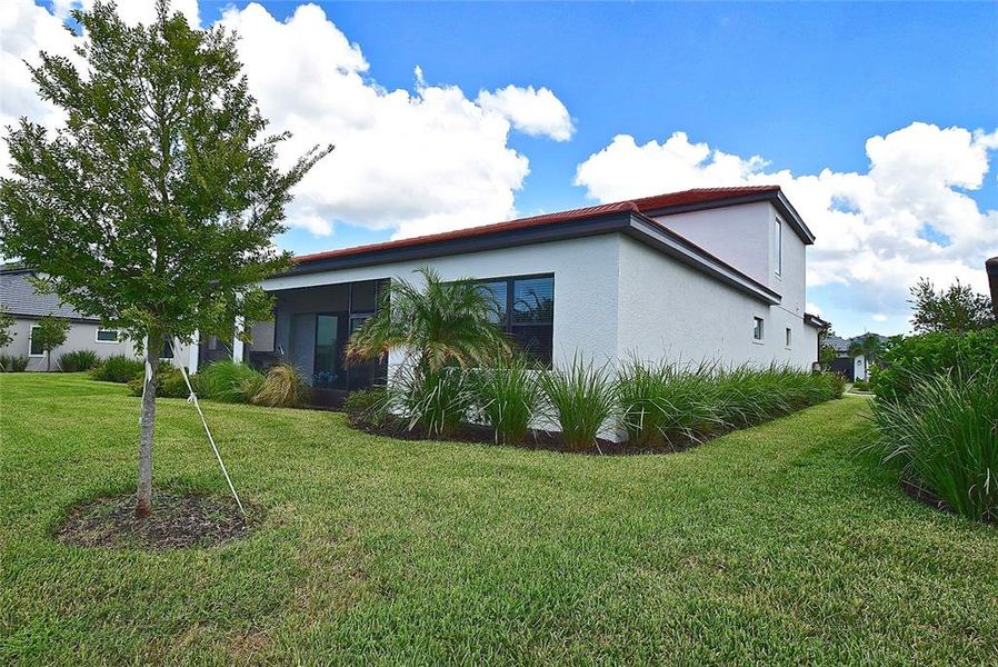 Exterior details and patio area of a home in , Nokomis (Image 24).