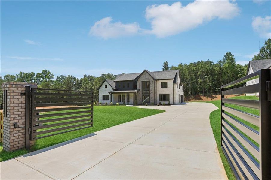 Front exterior of a new home in , Braselton, GA, highlighting curb appeal (Image 34).