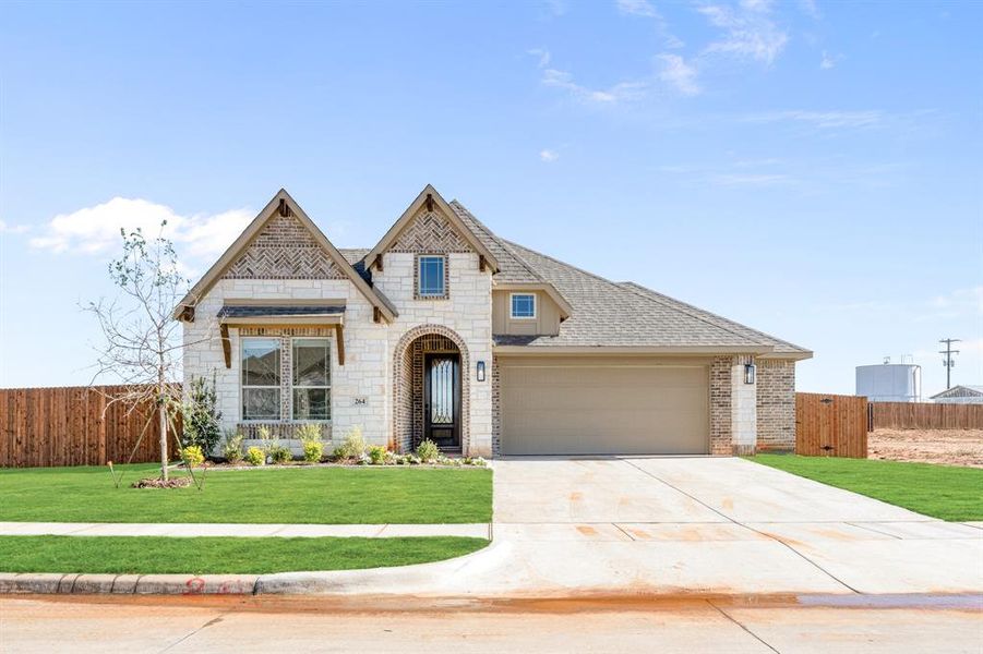 Front exterior of a new home in El Dorado, Granbury, TX, highlighting curb appeal (Image 1). Front exterior of a new home in El Dorado, Granbury, TX, highlighting curb appeal (Image 1).