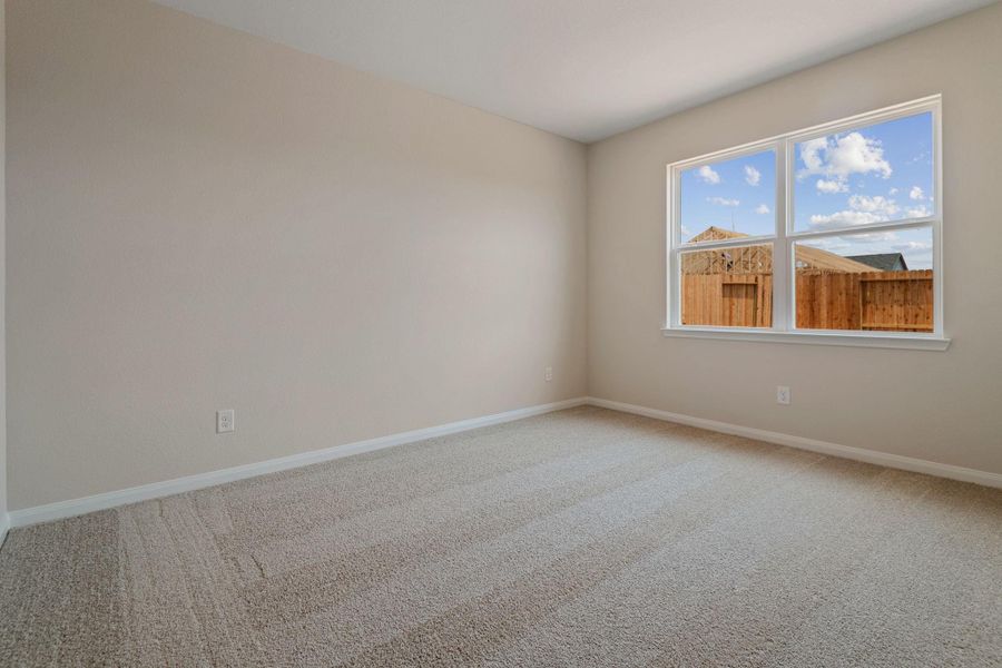 Spacious, unfurnished interior of a new home in Trails at Cochran Ranch, Waller (Image 21).