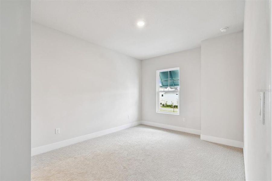 Spacious, unfurnished interior of a new home in Emerald Landing at Waterside at Lakewood Ranch – Lake Series, Sarasota (Image 29).