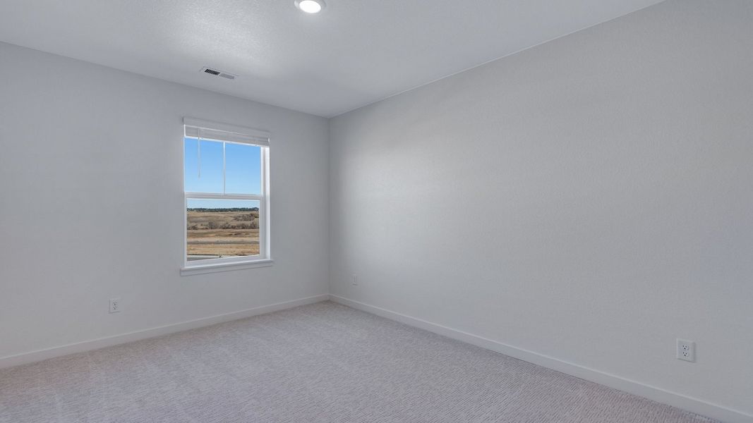 Spacious, unfurnished interior of a new home in Trails at Crowfoot, Parker (Image 22).
