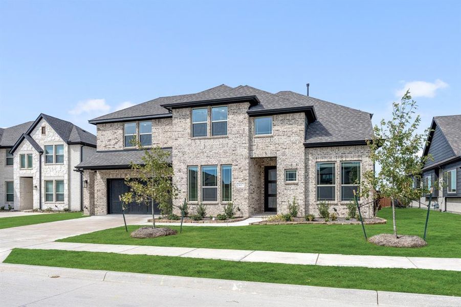Front exterior of a new home in Devonshire Classic 60-65, Forney, TX, highlighting curb appeal (Image 2).