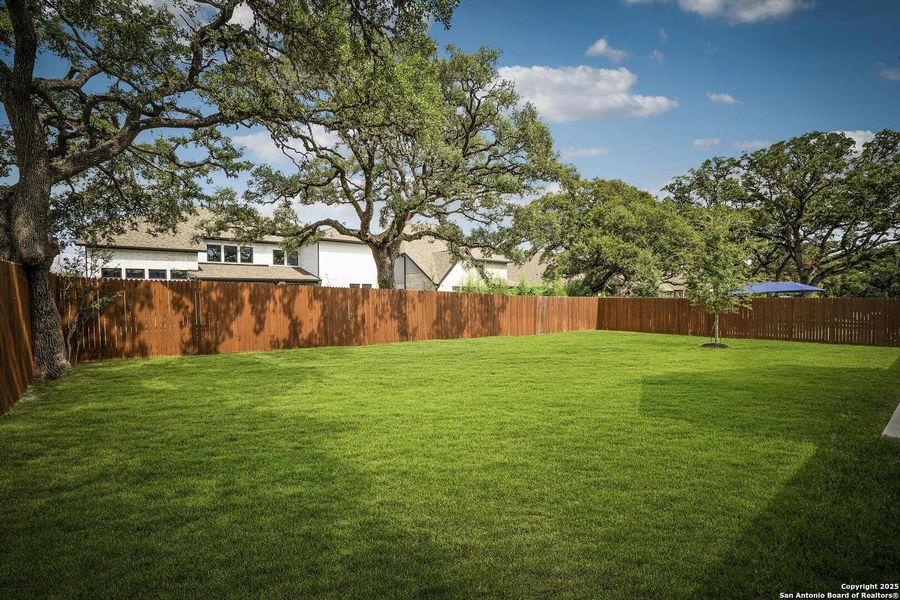 Exterior details and patio area of a home in Balcones Creek 70', Boerne (Image 23).