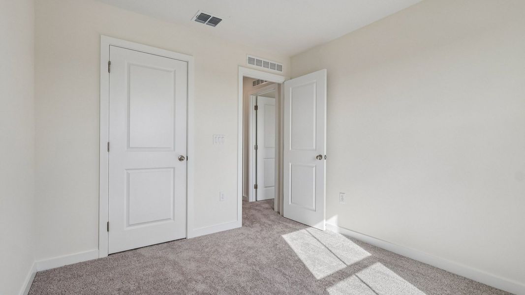 Furnished interior view inside a new home in Cyrene at Harmony, St. Cloud (Image 40).