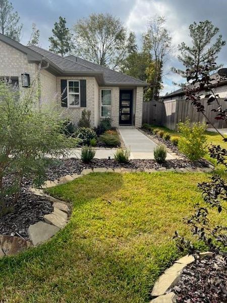 Landscaped and manicured lawn